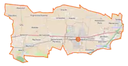 Mapa konturowa gminy Ożarów Mazowiecki, blisko centrum na prawo znajduje się punkt z opisem „Ożarów Mazowiecki”