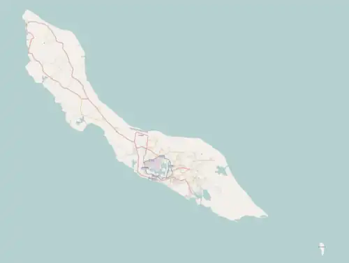 Mapa konturowa Curaçao, u góry po lewej znajduje się punkt z opisem „Rust en Pad”
