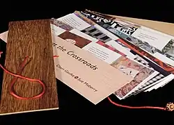 „Offerings at the crossroads” to książka artystyczna autorstwa Cheri Gaulke i Sue Maberry. Wykonana w nakładzie 100 egzemplarzy, odnosi się do balijskich książek palmowych. Zaprojektowana na komputerze i wydrukowana cyfrowo. Jest to historia dwóch par w podróży na Bali, z których jedno próbuje począć dziecko a drugie umiera na AIDS; opowiedziana obrazami i tekstem.