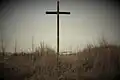 Krzyż pozostały na terenie dawnej wsi