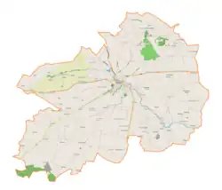 Mapa konturowa gminy Opatów, blisko centrum na dole znajduje się punkt z opisem „Czerników Karski”