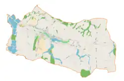 Mapa konturowa gminy Osiek, blisko centrum na prawo znajduje się punkt z opisem „Osiek Górny”