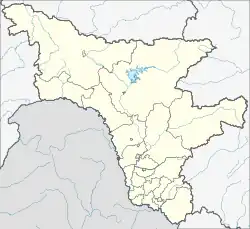 Mapa konturowa obwodu amurskiego, blisko centrum na dole znajduje się punkt z opisem „Kosmodrom Wostocznyj”