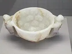 Filiżanka z żadu z uszkami w kształcie dzieci. Dynastia Song