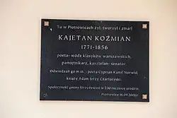 Tablica pamiątkowa na dworku