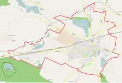 Mapa konturowa Pobiedzisk, blisko centrum na dole znajduje się punkt z opisem „Probostwo”