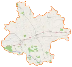 Mapa konturowa powiatu kolskiego, na dole znajduje się punkt z opisem „Las Rzuchowski”