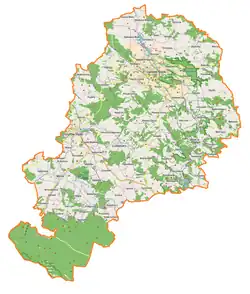 Mapa konturowa powiatu lwóweckiego, na dole po lewej znajduje się punkt z opisem „Zameczek w Kotlinie”