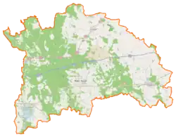 Mapa konturowa powiatu nowotomyskiego, blisko centrum u góry znajduje się punkt z opisem „Stacja Linii Radioliniowych Bolewice”