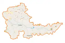 Mapa konturowa powiatu proszowickiego, blisko centrum na lewo znajduje się punkt z opisem „Proszowice”