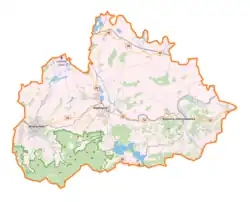 Mapa konturowa powiatu wadowickiego, po lewej nieco na dole znajduje się ikonka pałacu z opisem „Zamek Andrychowski”
