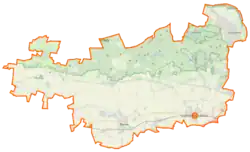 Mapa konturowa powiatu warszawskiego zachodniego, na dole znajduje się punkt z opisem „Błonie”