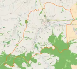 Mapa konturowa Pruchnika, blisko prawej krawędzi u góry znajduje się ikonka zamku z wieżą z opisem „Zamek w Pruchniku”