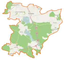 Mapa konturowa gminy Przygodzice, blisko centrum na dole znajduje się punkt z opisem „Wydymacz”