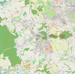 Mapa konturowa Pszowa, w centrum znajduje się punkt z opisem „KWK Anna”