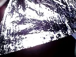 Fragment otwartego żagla deobritacyjnego satelity PW-Sat2 tuż po otwarciu na orbicie 29 grudnia 2019 roku