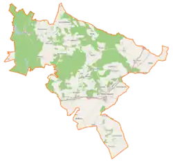 Mapa konturowa gminy Rakoniewice, blisko centrum na prawo znajduje się punkt z opisem „Rakoniewice”
