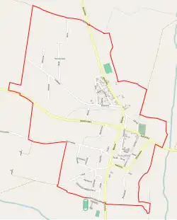 Mapa konturowa Raszkowa, na dole znajduje się punkt z opisem „Parafia Podwyższenia Krzyża Świętego”