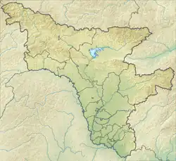 Mapa konturowa obwodu amurskiego, blisko dolnej krawiędzi po prawej znajduje się punkt z opisem „Rezerwat Chingański”