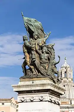 Kompozycja rzeźbiarska będąca alegorią czynu