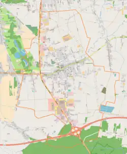Mapa konturowa Rzgowa, w centrum znajduje się punkt z opisem „Parafia pw.Świętego Stanisława Biskupai Męczennika”