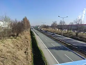 Widok na S1 i hale logistyczne z wiaduktu na ulicy A. Dzióbka (2022)