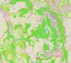 Mapa konturowa miasta San Marino, po prawej znajduje się czarny trójkącik z opisem „Monte Titano”