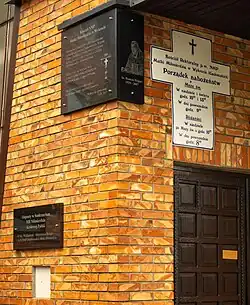 Tablice informacyjne nt. kościoła i sanktuarium