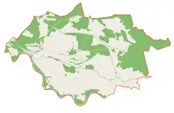 Mapa konturowa gminy Siedlisko, blisko centrum na dole znajduje się punkt z opisem „Radocin”