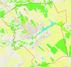 Mapa konturowa Siennicy, blisko centrum na dole znajduje się punkt z opisem „Stara Wieś”