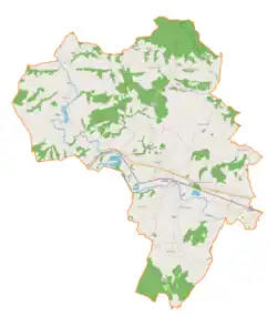 Mapa konturowa gminy Skołyszyn, u góry znajduje się punkt z opisem „ParafiaMatki Bożej Królowejw Jabłonicy”