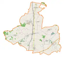 Mapa konturowa gminy Skoroszyce, blisko centrum u góry znajduje się punkt z opisem „Parafia św. Michała Archanioła”