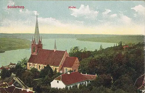 Kościół na pocztówce z 1912, widoczna wieża przed przebudową