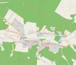 Mapa konturowa Stąporkowa, w centrum znajduje się punkt z opisem „Stąporków”