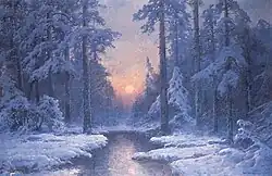 Zachód słońca w zimowym lesie