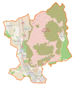 Mapa konturowa gminy Suchy Las, blisko centrum na lewo znajduje się punkt z opisem „Gogulec”