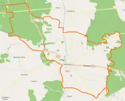 Mapa konturowa Sulmierzyc, blisko centrum na dole znajduje się punkt z opisem „Ratusz w Sulmierzycach”