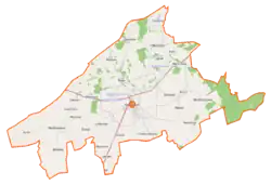 Mapa konturowa gminy Szczuczyn, blisko centrum na prawo u góry znajduje się punkt z opisem „Guty”