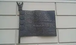 Tablica na ścianie zewnętrznej Collegium Iuridicum I