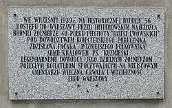 Tablica na ścianie kościoła św. Wawrzyńca