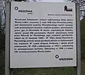 Tabliczka informacyjna przy pomniku