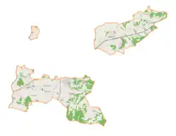 Mapa konturowa gminy wiejskiej Tarnów, na dole nieco na lewo znajduje się punkt z opisem „Radlna”