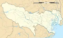 Mapa konturowa prefektury Tokio, blisko centrum u góry znajduje się punkt z opisem „Higashimurayama”