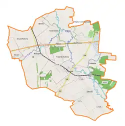 Mapa konturowa gminy Trawniki, u góry nieco na prawo znajduje się punkt z opisem „Majdan Siostrzytowski”