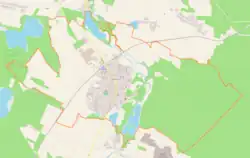 Mapa konturowa Tułowic, w centrum znajduje się punkt z opisem „Parafia św. Rocha w Tułowicach”