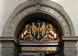 Herb z wejścia do kaplicy piastowskiej w kościele franciszkańskim w Opolu