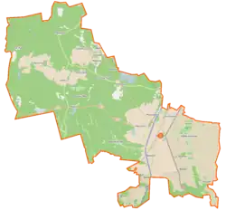 Mapa konturowa gminy Warlubie, blisko centrum na prawo znajduje się punkt z opisem „Osiny”