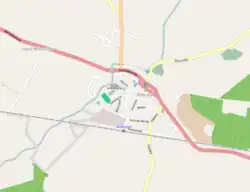 Mapa konturowa Wołczyna, w centrum znajduje się punkt z opisem „Parafia NMP Niepokalanie Poczętej w Wołczynie”