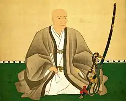 Toyokuni Yamana (1548–1626), samuraj i dowódca z okresu Sengoku trzymający tachi; widoczne ozdobne rapcie