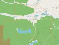 Mapa konturowa Zaklikowa, blisko centrum u góry znajduje się punkt z opisem „Parafia pw. św. Anny”